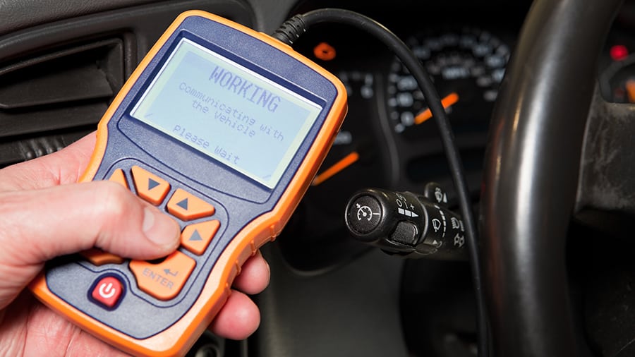 OBD-II scanner connected to a car.